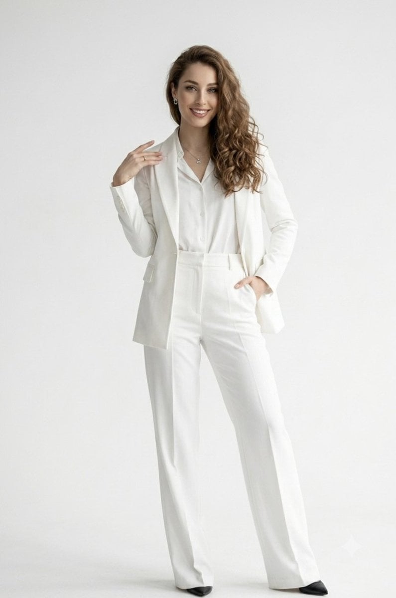 Elegant Woman in White Pantsuit
